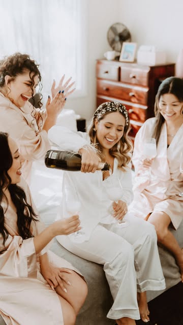 Getting ready for the most special day surrounded by my bridesmaids .