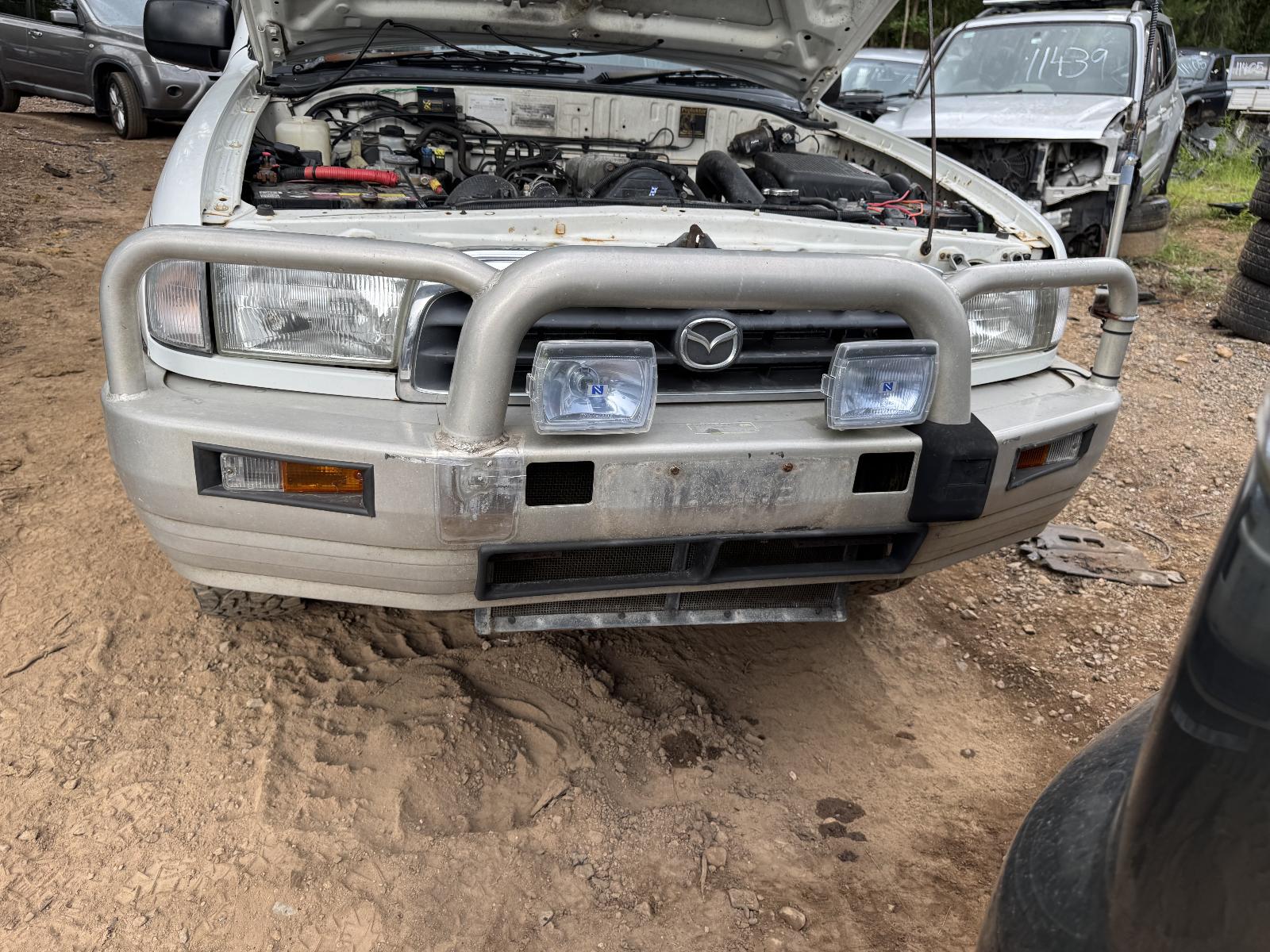View MAZDA BRAVO 2001 4 Door Utility Breaking