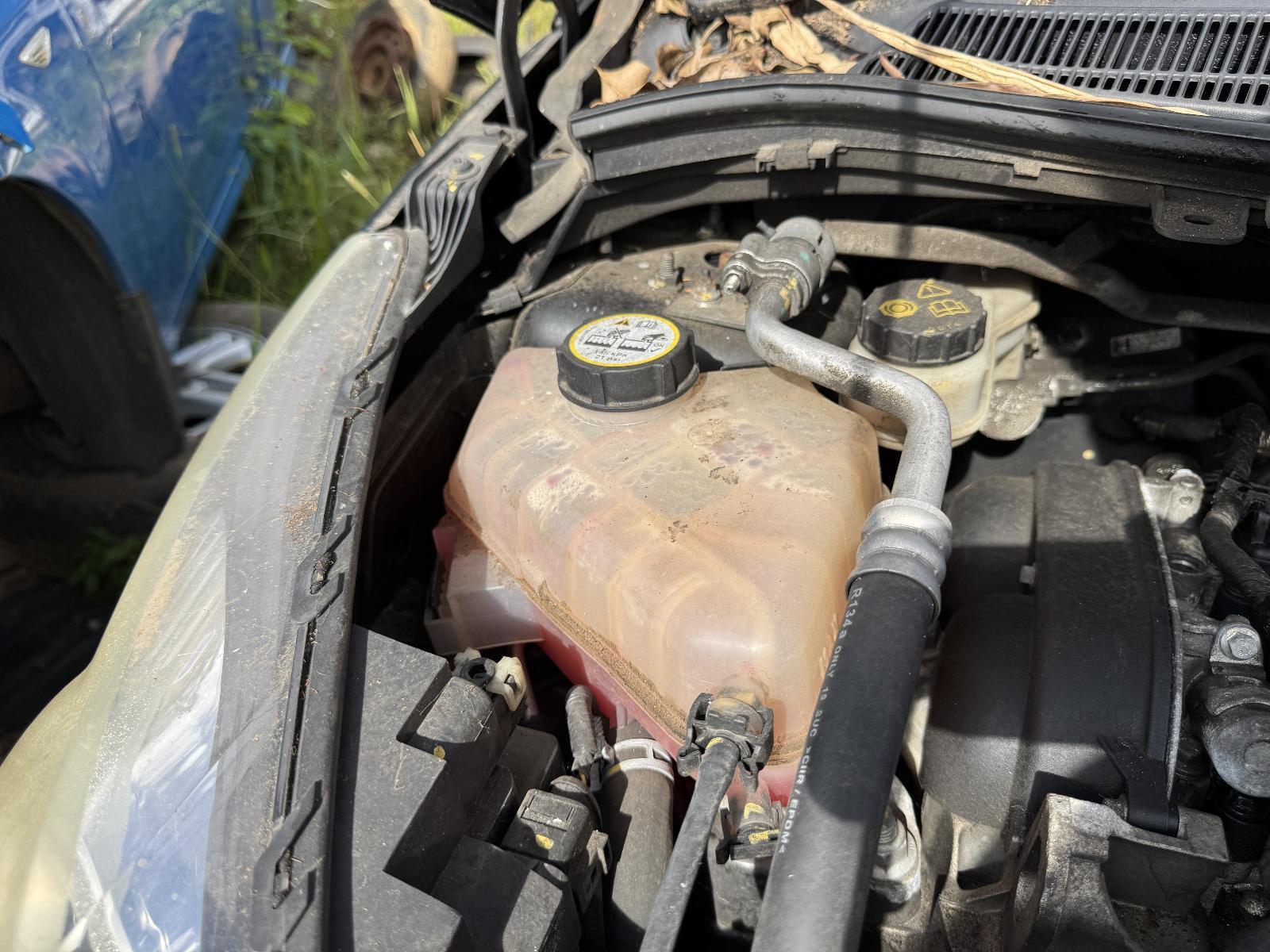 View Auto part Overflow Bottle FORD FIESTA 2011