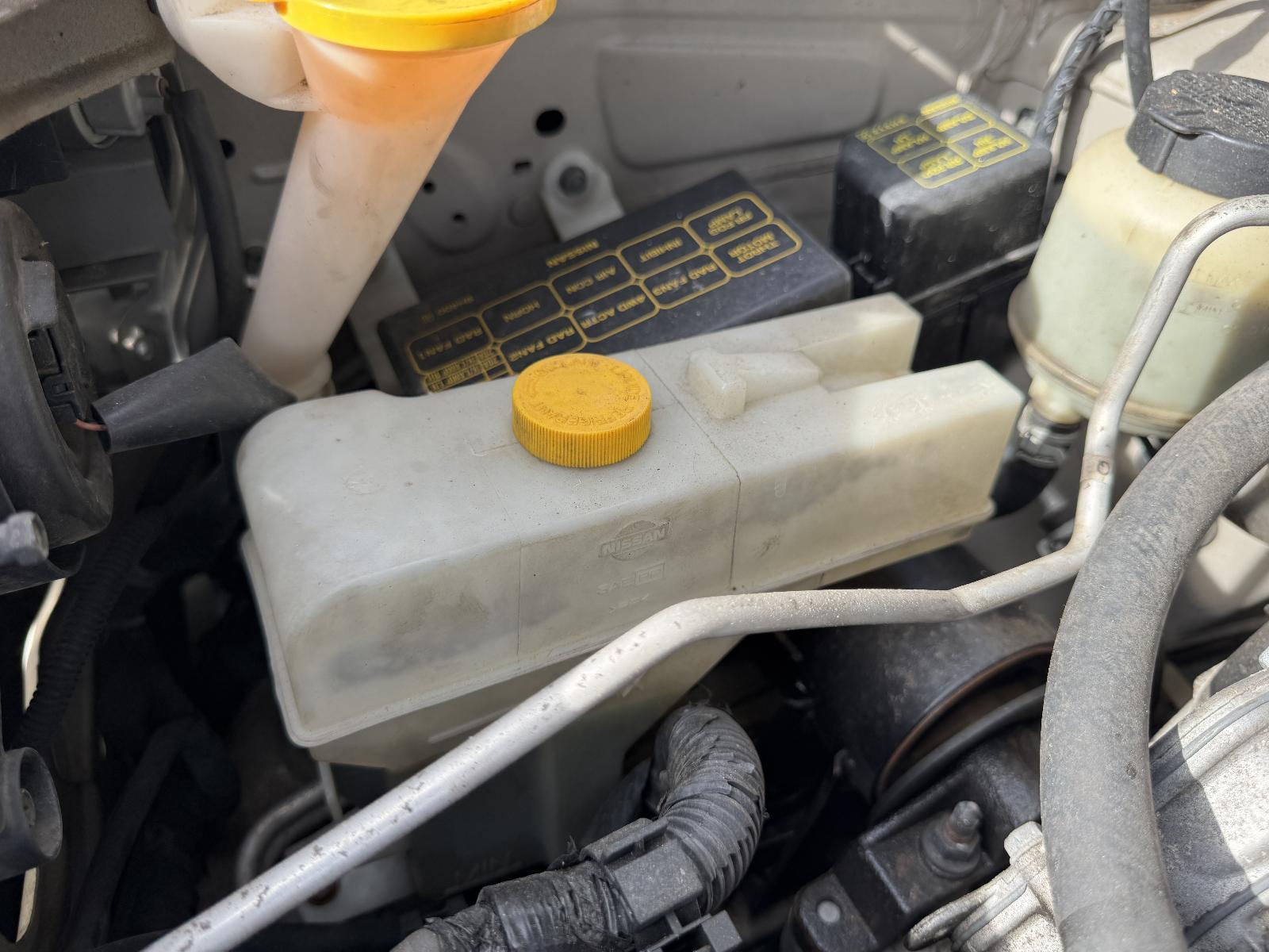 View Auto part Overflow Bottle NISSAN XTRAIL 2005