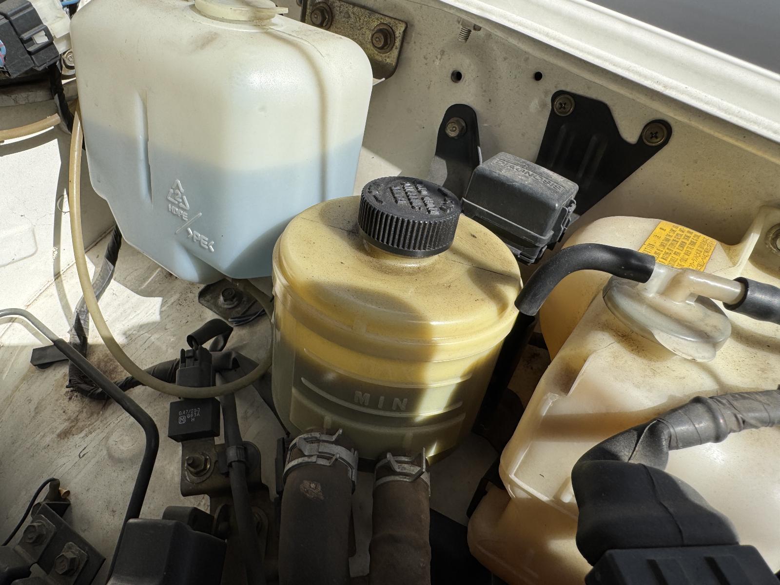 View Auto part P/S Reservoir FORD COURIER 1997