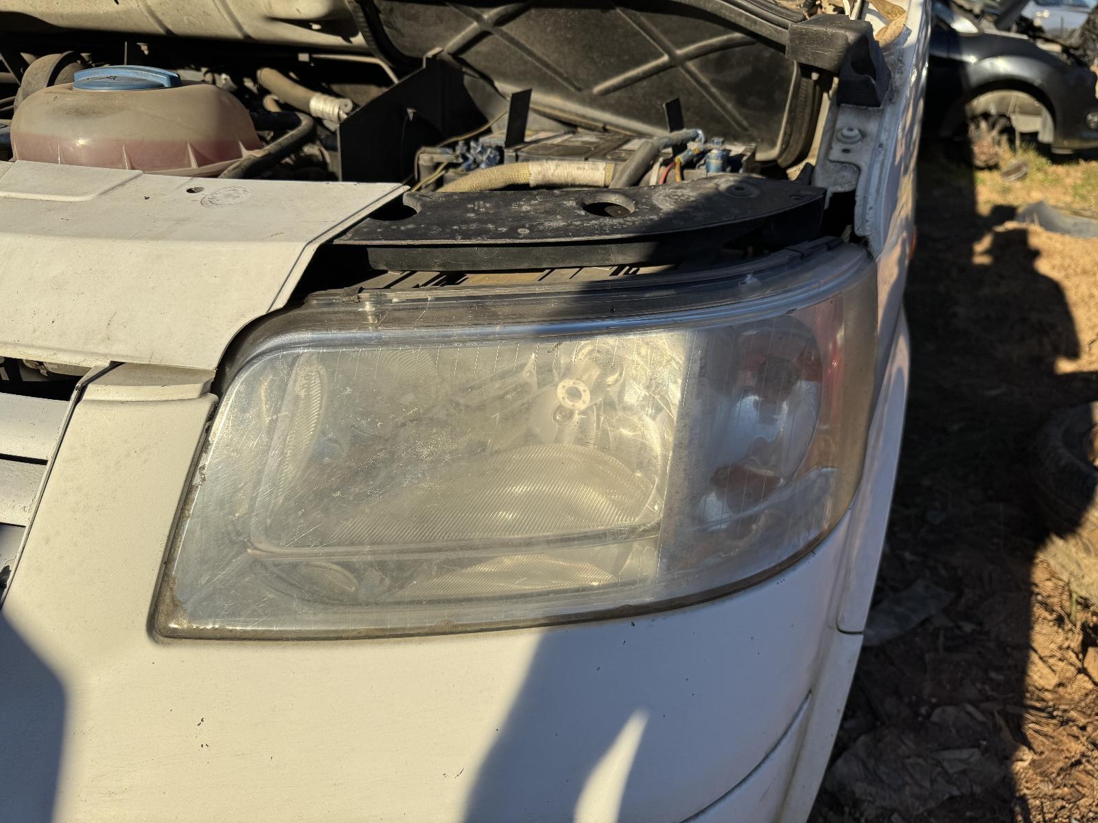 View Auto part Left Headlamp VOLKSWAGEN TRANSPORTER 2006