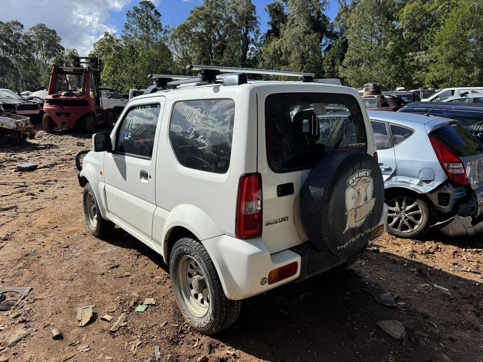 View Auto part Console Suzuki Jimny 2011