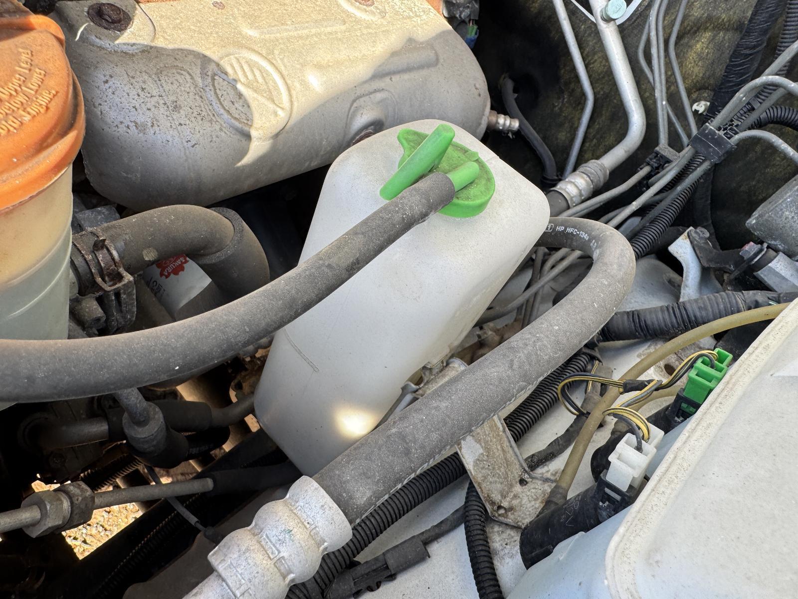 View Auto part Overflow Bottle SUZUKI JIMNY 2011