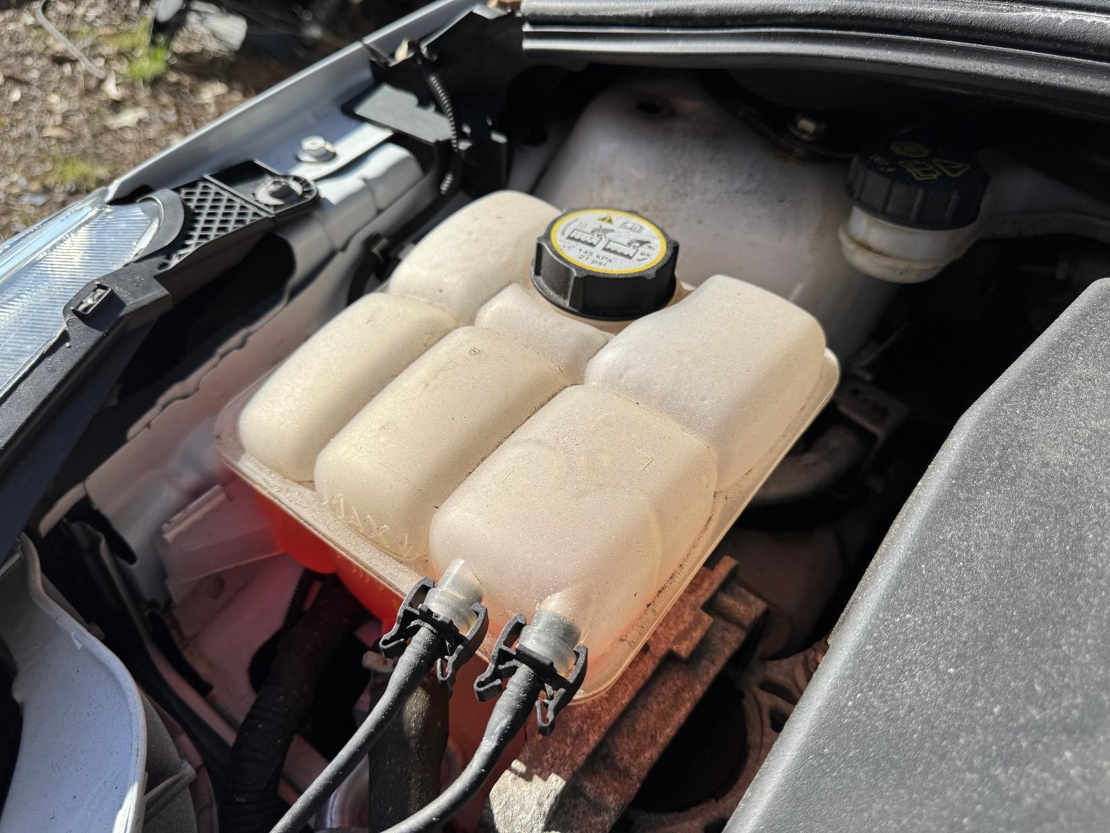 View Auto part Overflow Bottle FORD FOCUS 2015