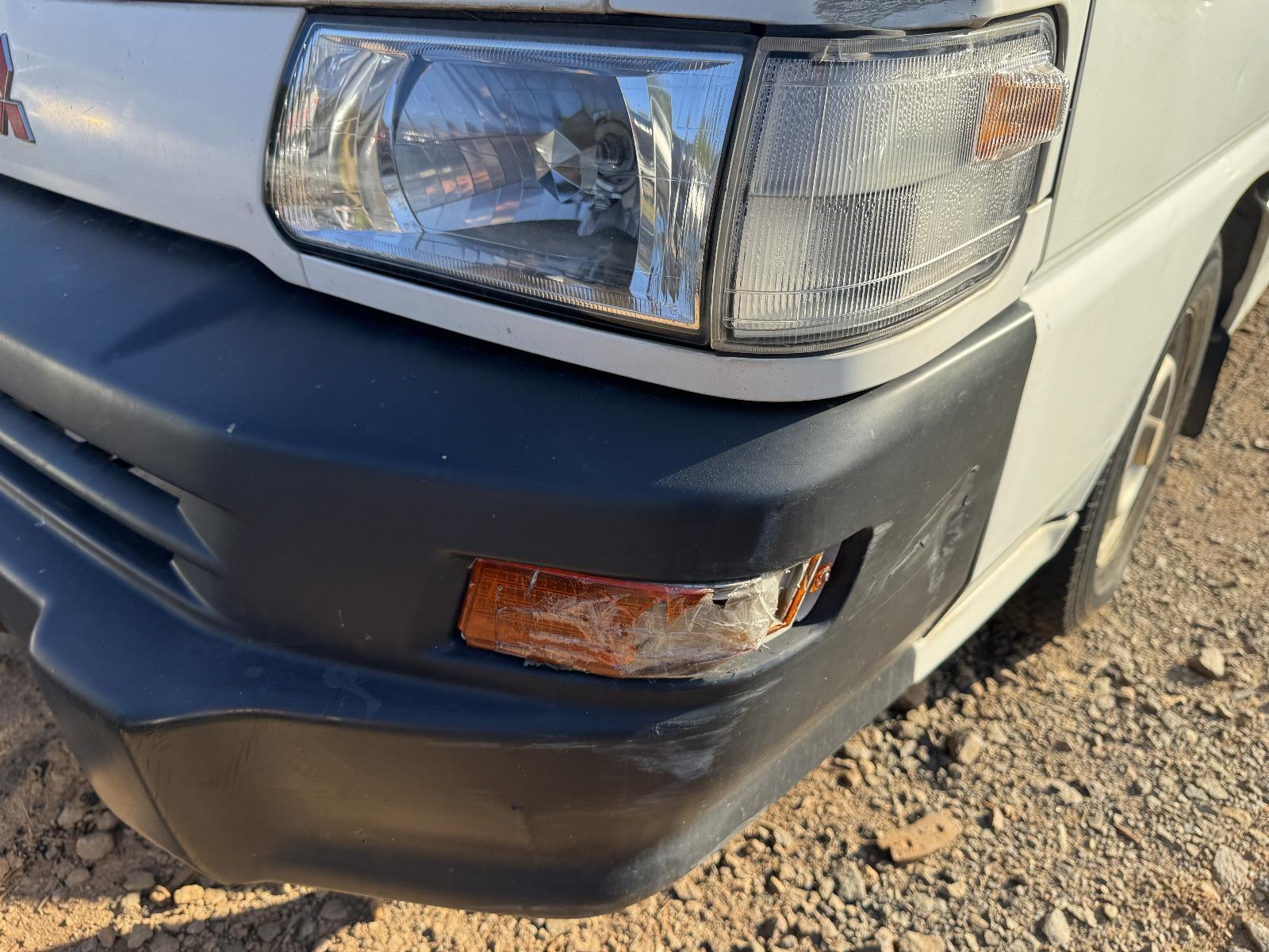 View Auto part Left Headlight Surround MITSUBISHI L300 2009