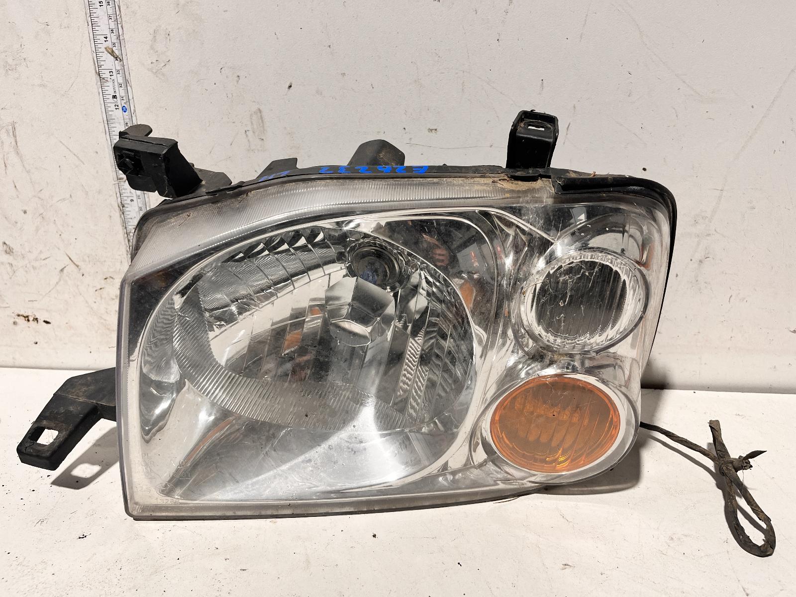 View Auto part Left Headlamp Nissan Navara 2004