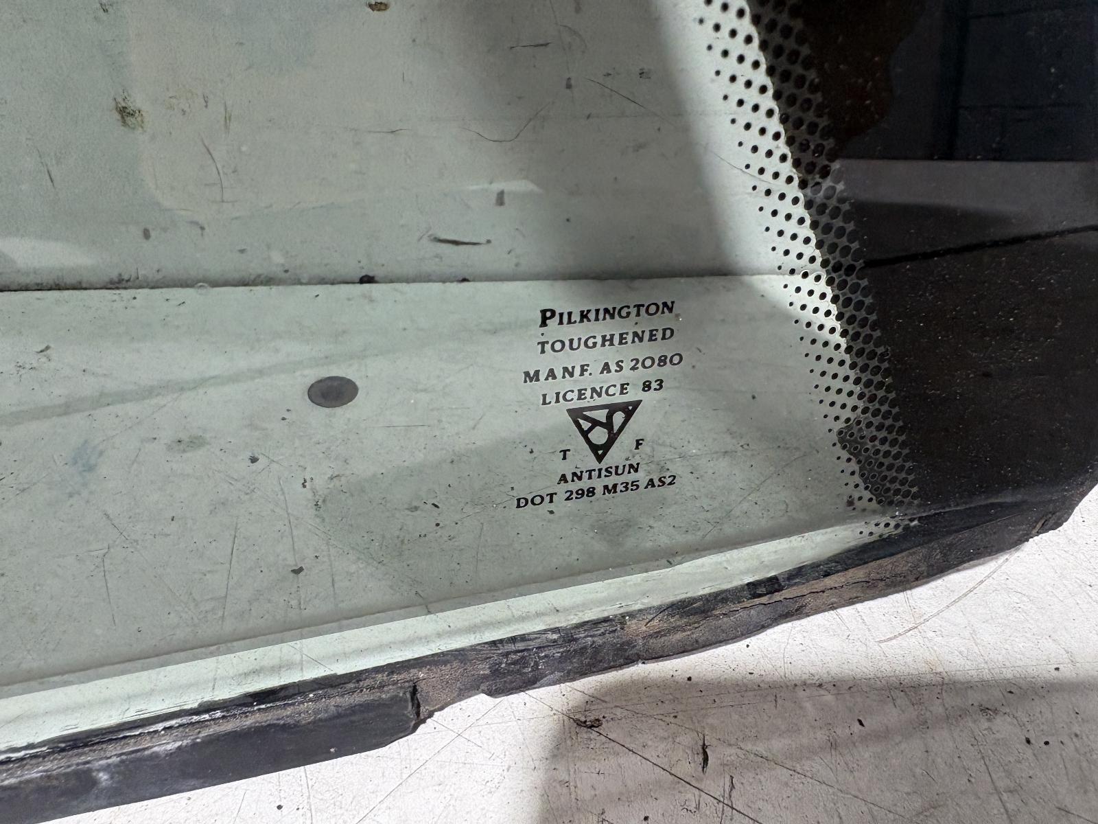 View Auto part Left Rear 1/4 Door Glass Holden Commodore 1991