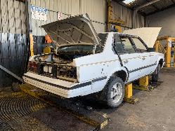 View Auto part Left Rear Wnd Reg/Motor Toyota Corona 1984