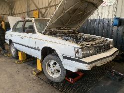 View Auto part Left Rear Wnd Reg/Motor Toyota Corona 1984