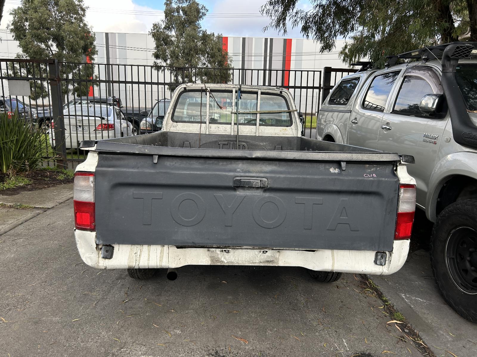 View Auto part Left Headlight Surround Toyota Hilux 2004