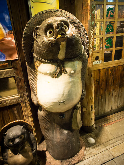 A Tanuki welcomes you to the restaurant