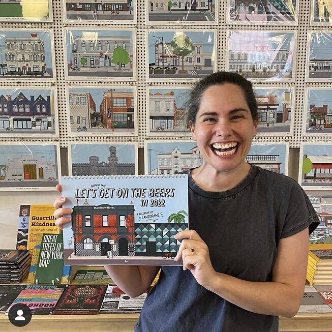 Laura with her 2022 calendar