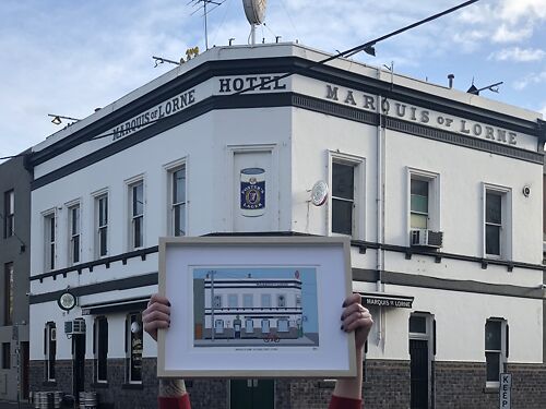 Laura Holley with her print of the Marquis of Lorne pub in Fitzroy