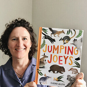 Artist Sarah Allen with her author-illustrated children's book, Jumping Joeys, published by Affirm Press.