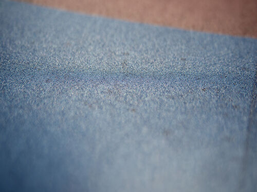 Ilford Raster Silk under strong side lighting so you can see the anti-scanning tessellated texture