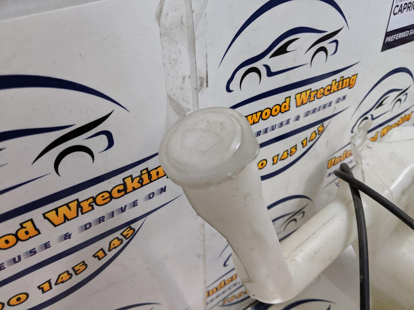 View Auto part Washer Bottle Mazda 2 2010