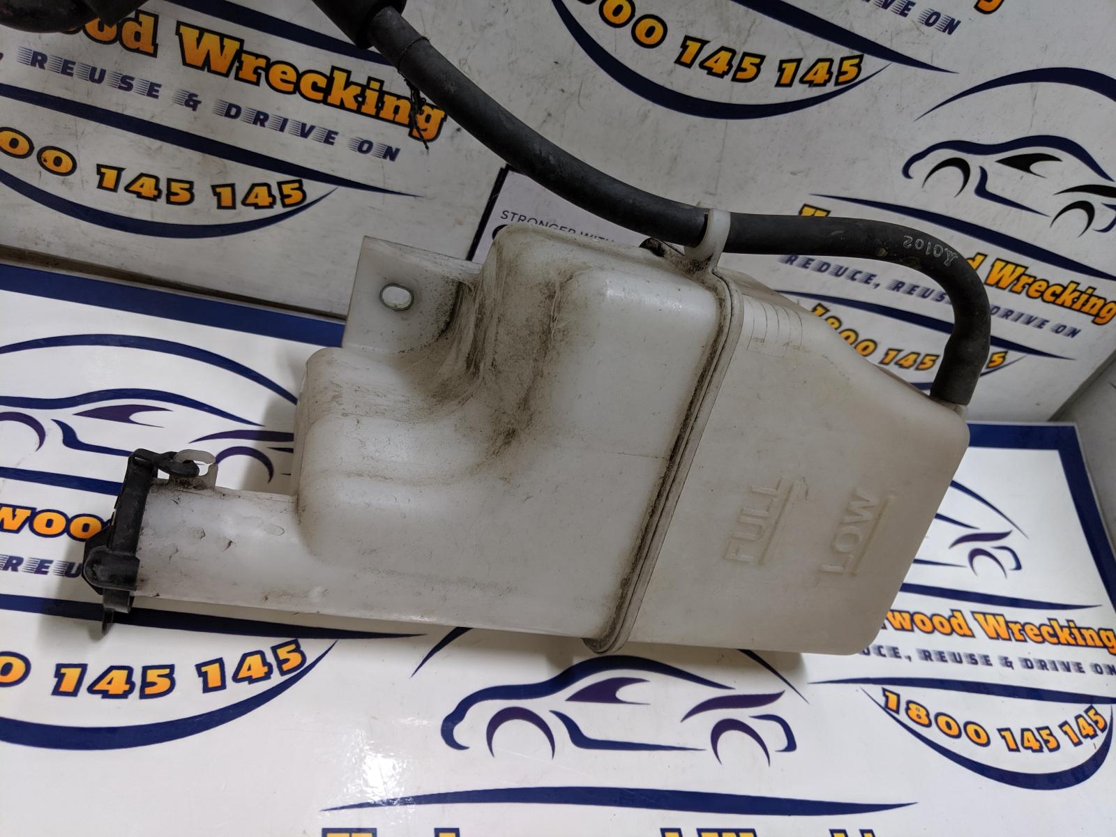 View Auto part Overflow Bottle Mazda 2 2010