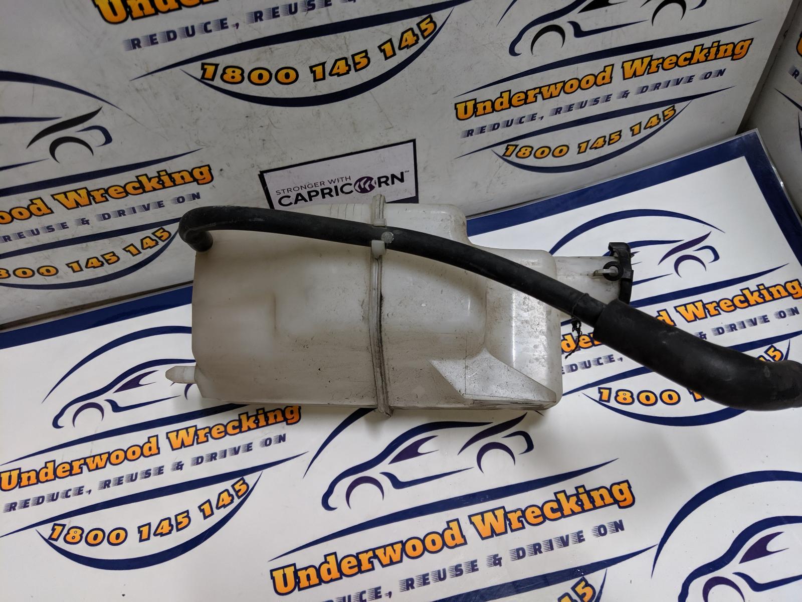 View Auto part Overflow Bottle Mazda 2 2010
