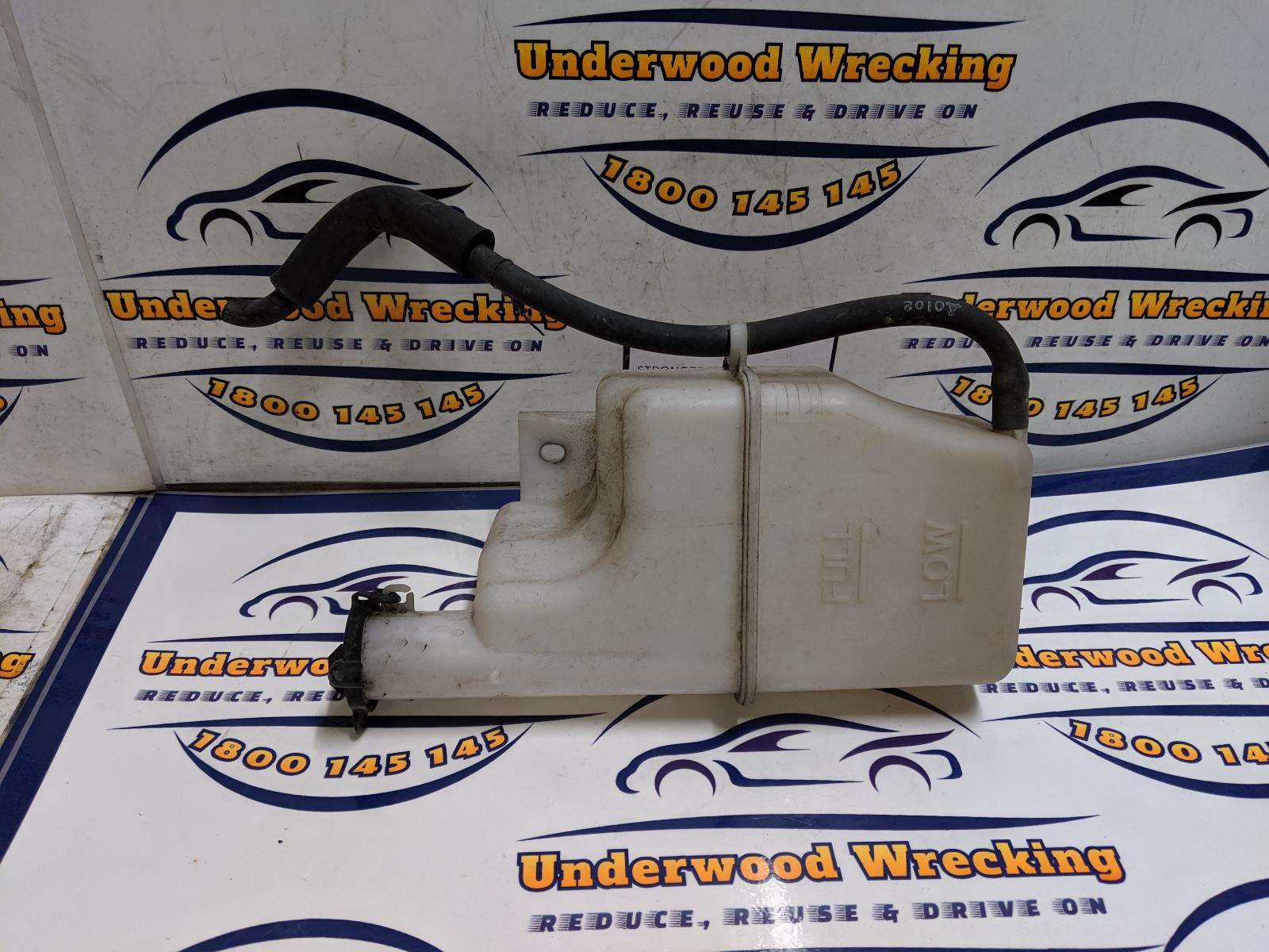 View Auto part Overflow Bottle Mazda 2 2010