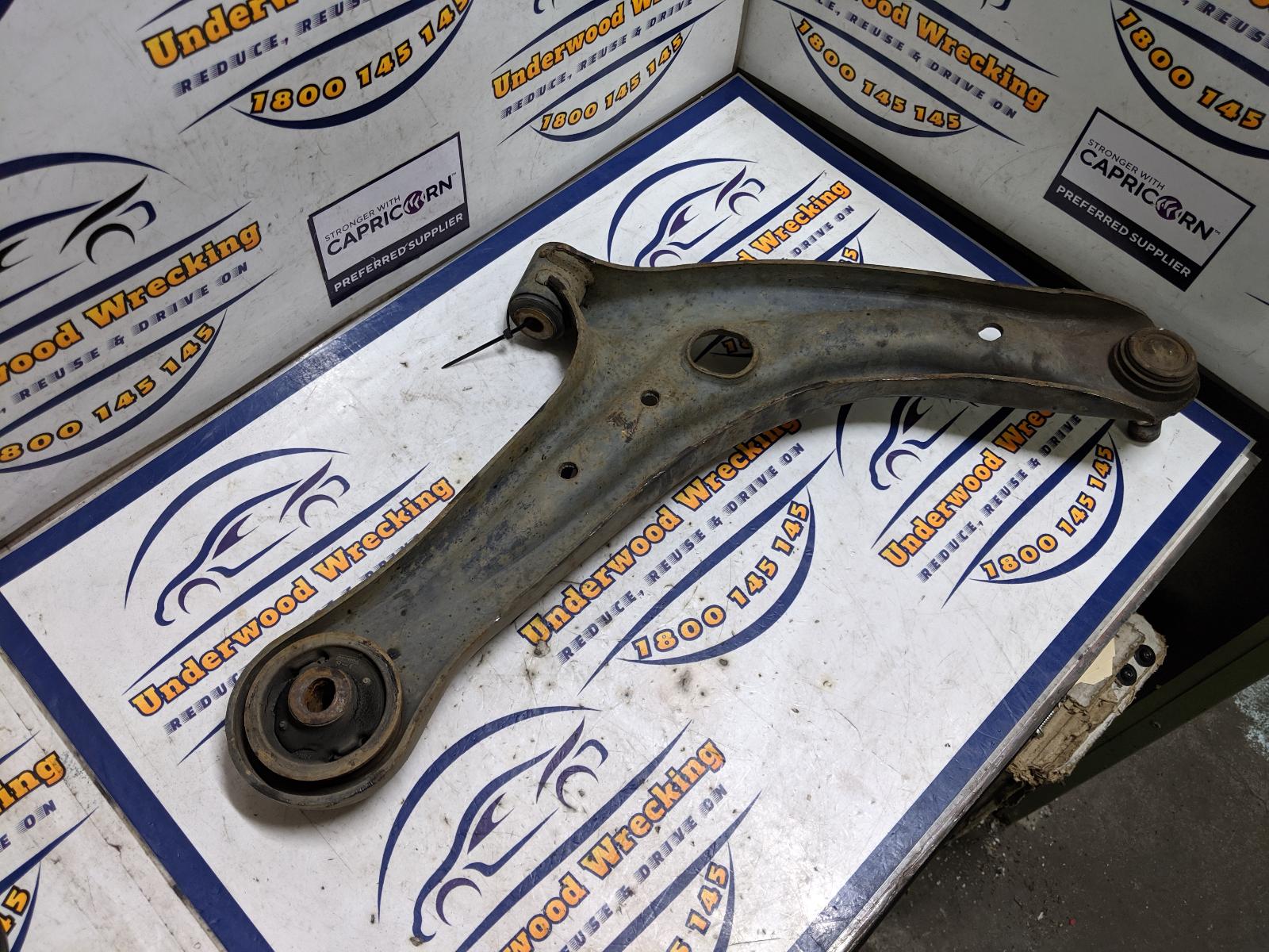 View Auto part Left Front Lower Control Arm Mazda 2 2010