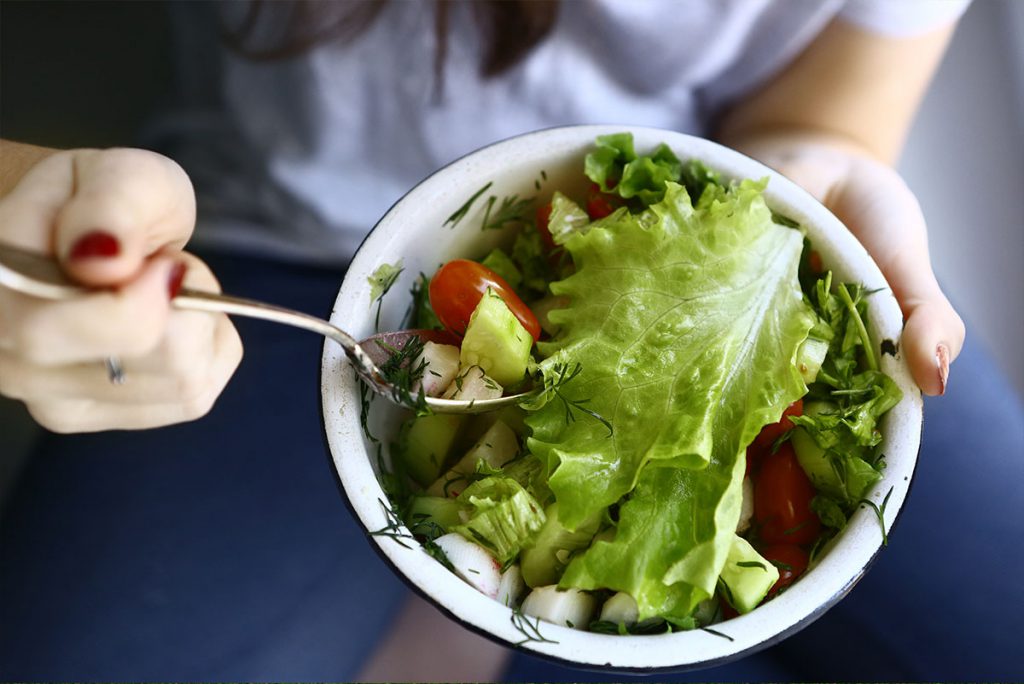 Urbanest resident with healthy greens on a student budget