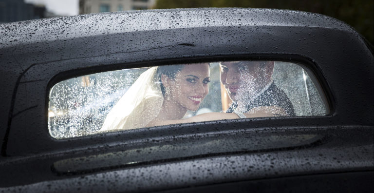wedding photography melbourne album layout bride and groom in back of limo