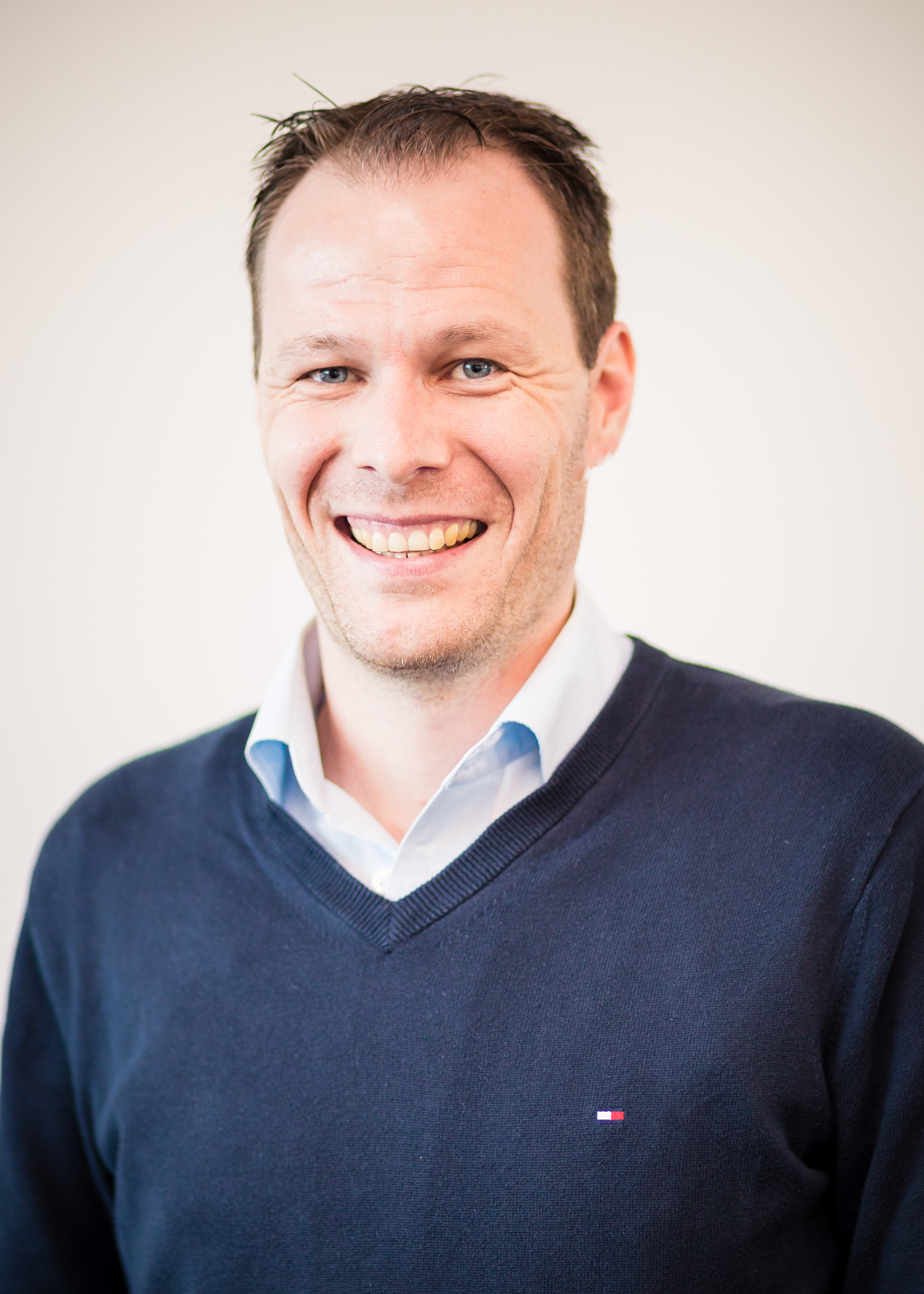 A portrait photo of Dr Nico Schulenkorf.