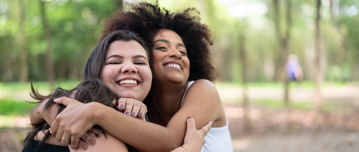 Two women hugging