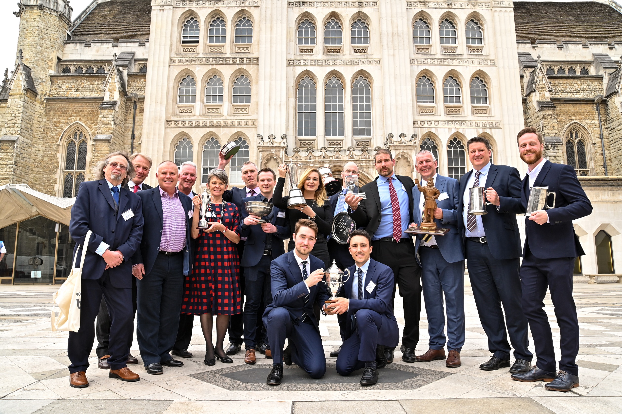 Aussie brewers triumph at awards around the world Trophy winners celebrate their win outside London's Guildhall
