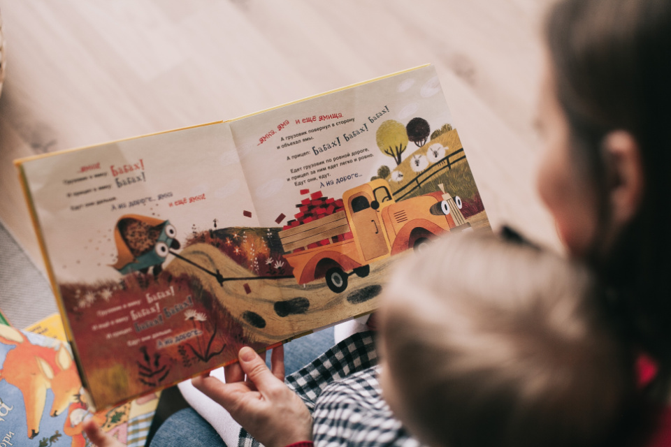 Reading the SAME book to your child over and over makes them smarter, claims experts
