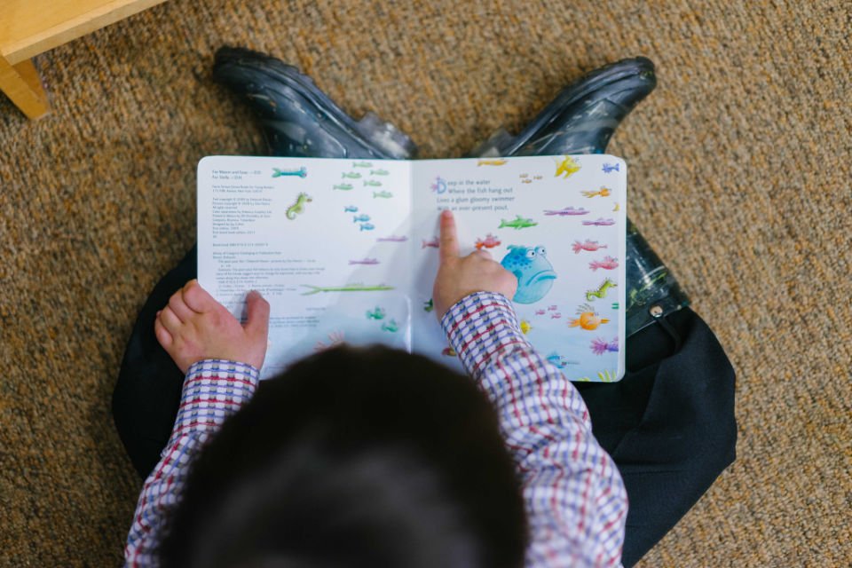 Reading the SAME book to your child over and over makes them smarter, claims experts