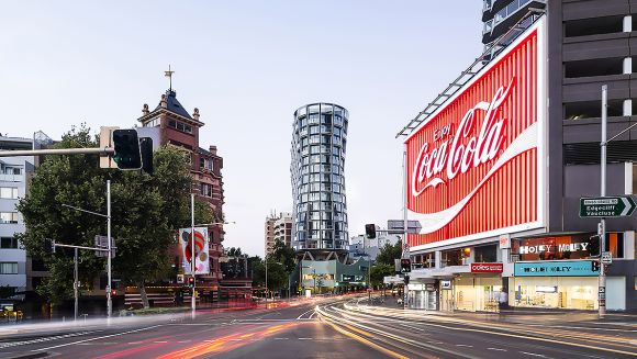 The strikingly curvaceous form of Omnia draws on New York's Flatiron. Image: Supplied Lord Mayor officially opens Greenland Australia's Omnia in Potts Point