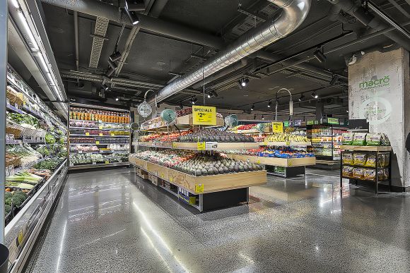 The interior of the Woolworths at Omnia has employed a pared back industrial aesthetic. Image: Supplied Greenland Australia's Omnia welcomes Wooloworths Metro as first tenant in retail podium