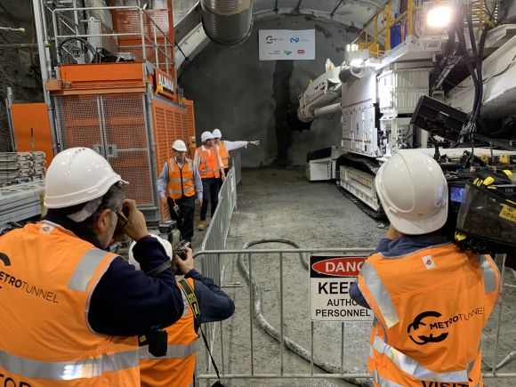 The Premier and Melbourne Metro CEO Evan Tattersall inspect the new road header machine CBD Metro tunnel station construction begins