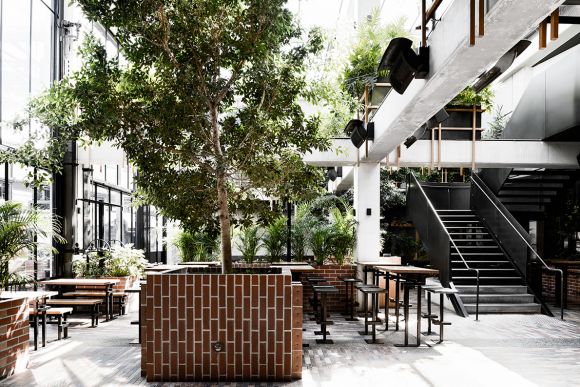 The retractable roof allows ample light into the Beer Garden. Image: Supplied TILT and Technē shed some light on the Village Belle Hotel revamp