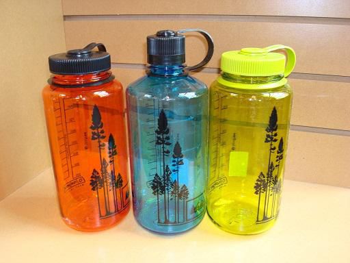Reusable plastic water bottles.