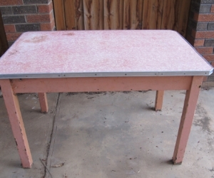 Wooden table with formica top