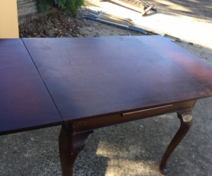 Dining table with extended leaves, other used tables