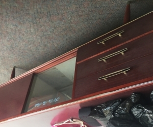 Sideboard with sliding glass door