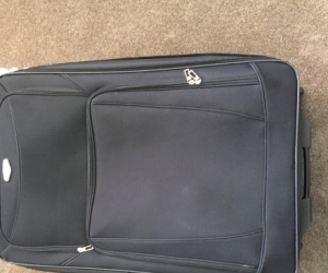 Large suitcase with wheels