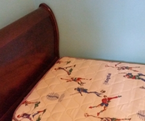 Single Sleigh style slat bed