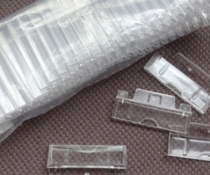 Plastic tabs for filing cabinet drop files