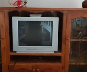 Timber entertainment unit with working 68cm Philips Television