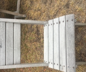 6 outdoor timber chairs and foot stool.