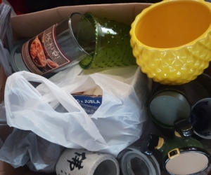 Box of old and new candles, wicks and containers - make recycled candles