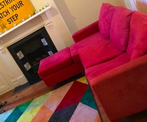 Red L-shaped couch