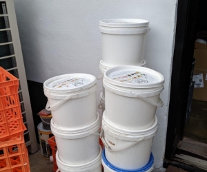 Excess coffee grinds and compostable waste