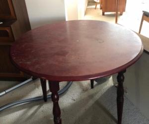 round woodenn table mahogany colour