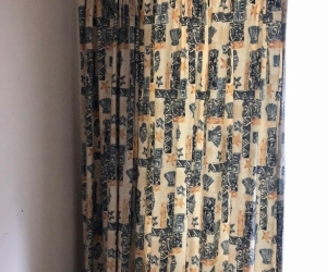 Two block out full length curtains